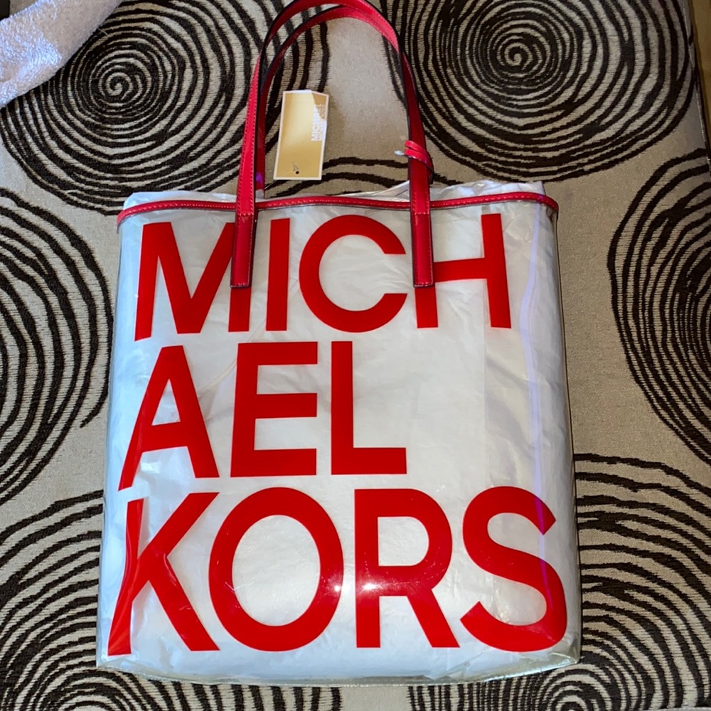 Clear Michael Kors tote bag.